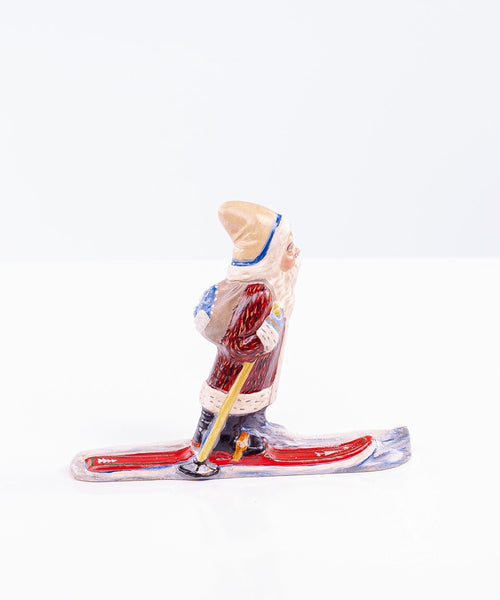 Load image into Gallery viewer, Vaillancourt Folk Art - Blue Trimmed Skiing Santa in Fur - Chalkware Figurine
